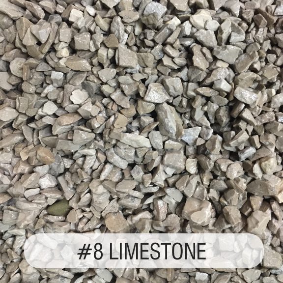 A pile of gravel with the words " limestone # 8 ".