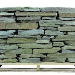 A large stone wall on top of a wooden crate.