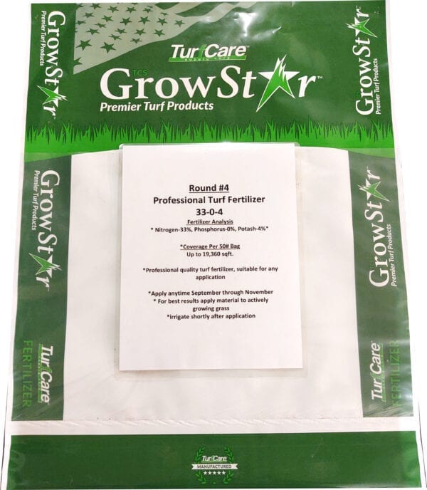 A package of grass seed that is on the ground.